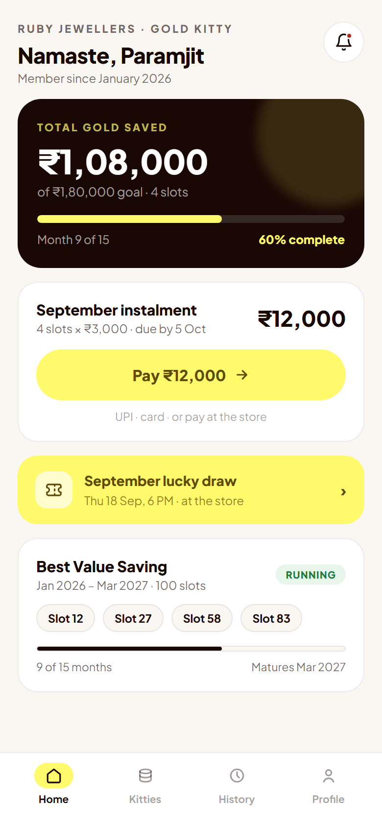 The GoldKitty member app home screen showing savings progress and the monthly instalment